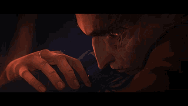 a close up of a man 's face with the words it 's okay on the bottom