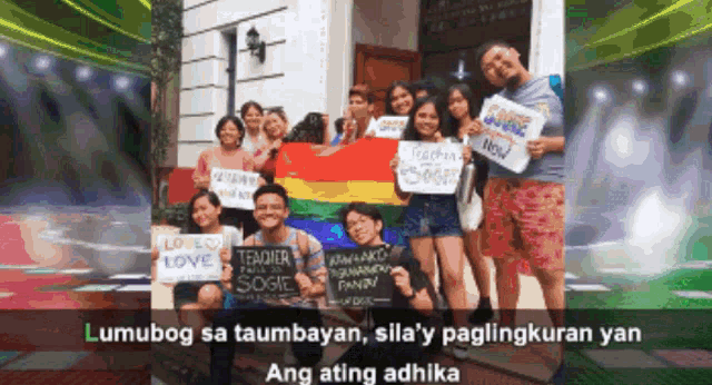 a group of people holding up signs including one that says " loved love "