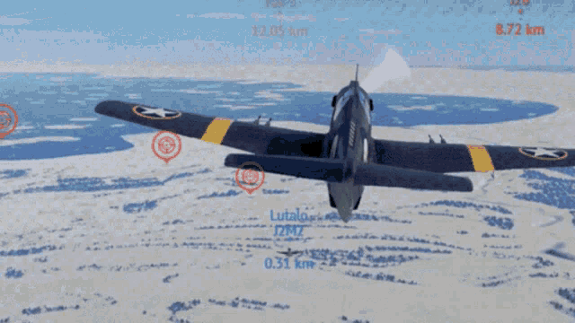 a plane is flying over a snowy field with a red target in the background