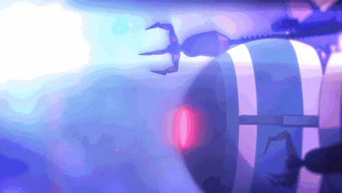 a purple and blue background with a red light in the middle of it