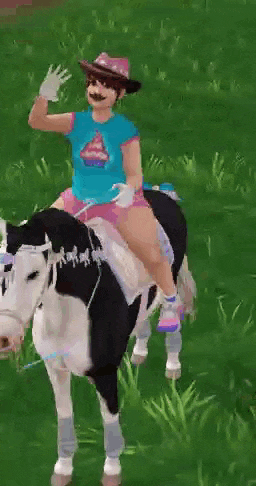a woman in a cowboy hat is riding a black and white horse
