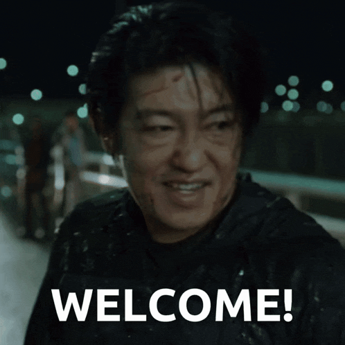 a man with blood on his face and the words welcome