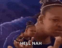 a woman is making a funny face and saying `` hell nah '' while giving a thumbs up .