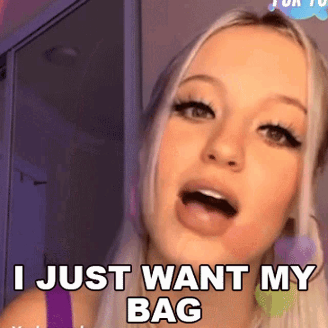 a woman says " i just want my bag " in a video