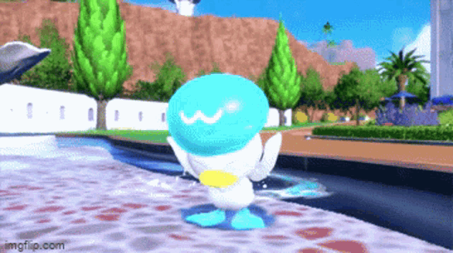 a blue and white cartoon character is standing in a pool .