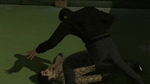 a man is being attacked by a monster and the number 4 is on the wall behind him
