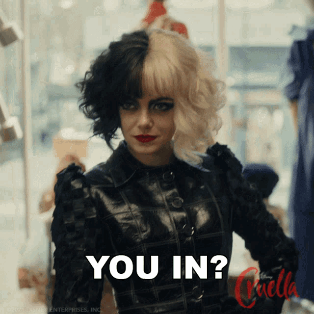 a woman with half black and half white hair is asking " you in "
