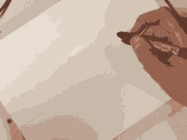 a pixelated image of a person 's hands holding something