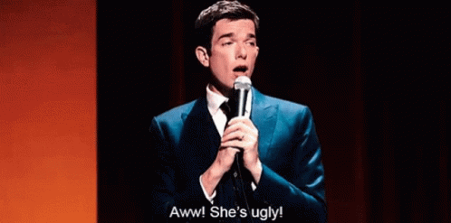 John Mulaney Aww Shes Ugly GIF - John Mulaney Aww Shes Ugly Not Beautiful GIFs