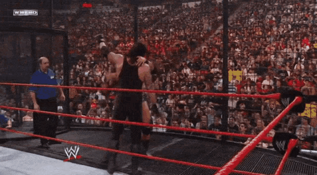 Undertaker Tombstone Taker Batista GIF - Undertaker Tombstone Taker Batista Wwe GIFs
