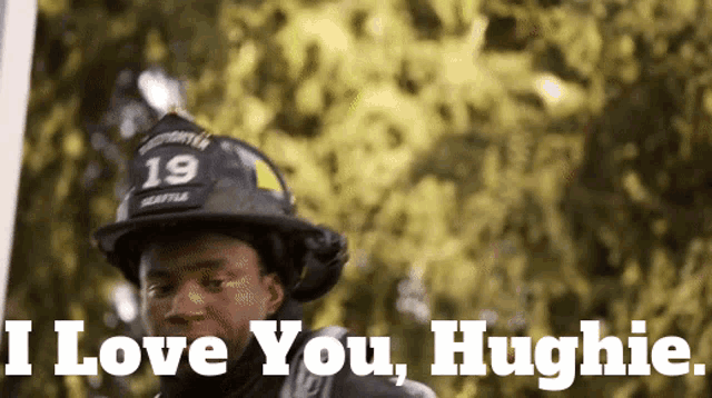 a fireman wearing a helmet with the number 19 on it