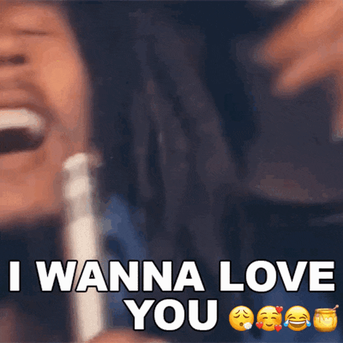 a man with dreadlocks is laughing with the words i wanna love you