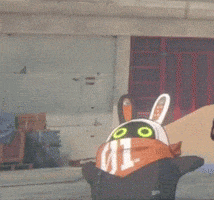a stuffed animal with the number 01 on its head