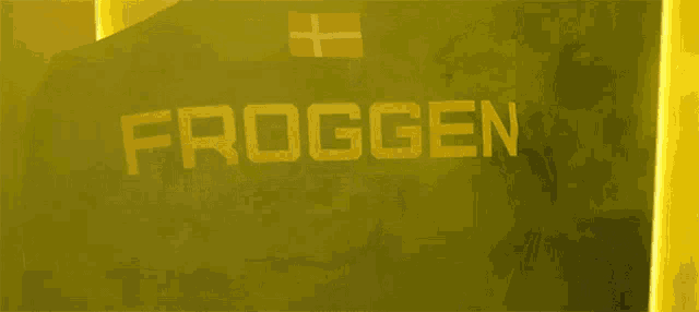 the word froggen is on the back of a black shirt
