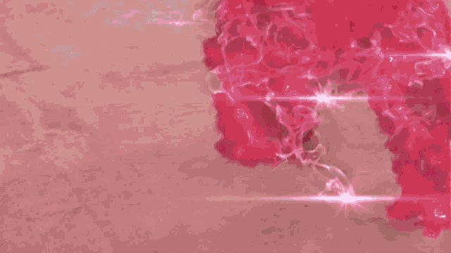 a blurry picture of a person 's legs with a purple light coming out of them