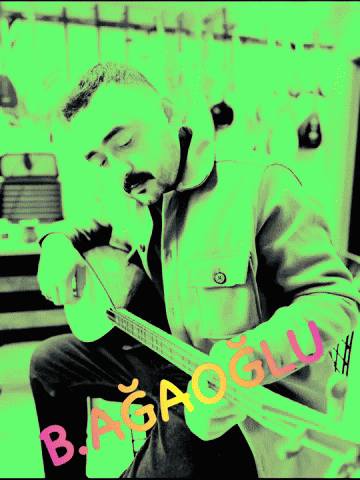 a man is playing a guitar with the name babaoglu written on the bottom