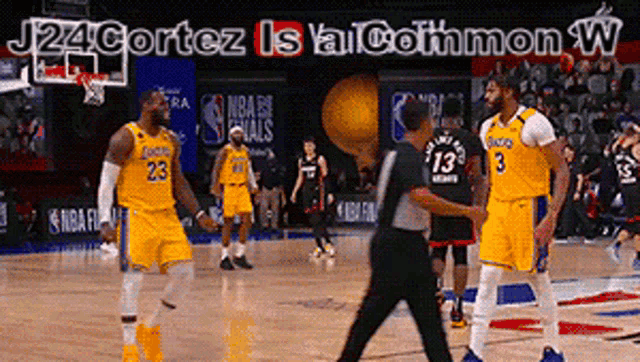 a basketball game is being played with the words j24 cortez is a cothmon w on the bottom
