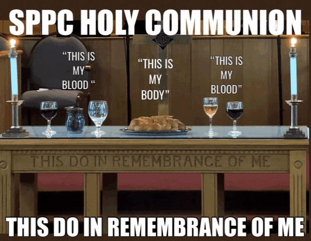 a table with wine glasses and bread on it with the words " this is my blood " written on it