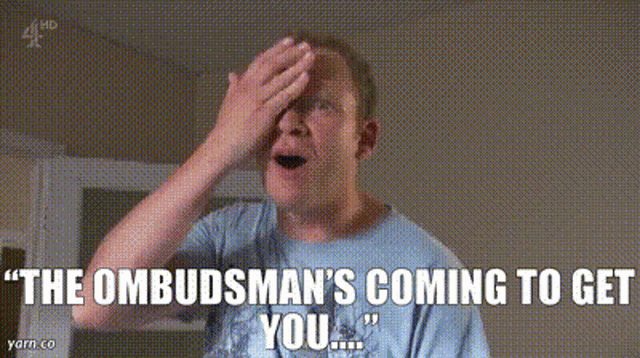 a man covering his face with his hand and the words " the ombudsman 's coming to get you " written below him