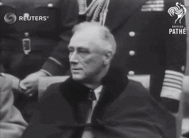 a black and white photo from reuters shows a man in a suit
