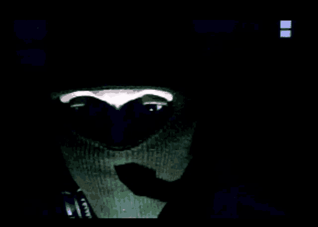 a close up of a person wearing a mask that says ' e ' on it