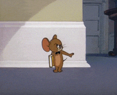 a cartoon character named jerry is standing next to a wall