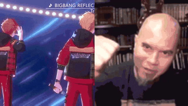 a man holding a microphone in front of a bigbang reflect sign