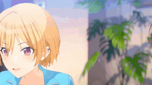 a girl with short blonde hair and purple eyes wearing a blue jacket