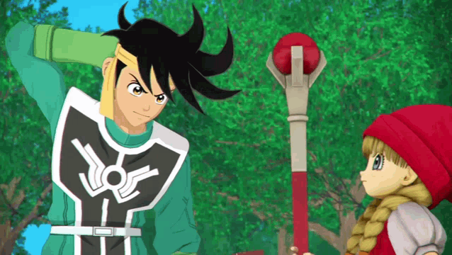 a girl in a red hood stands next to a man in a green vest