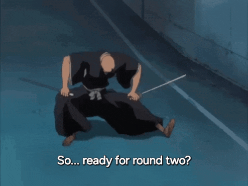 a man with a sword is kneeling down and says so ... ready for round two