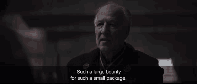 a man in a dark room says such a large bounty for such a small package .