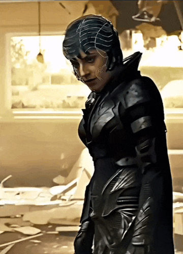 a drawing of a woman in a black suit with a helmet on her head