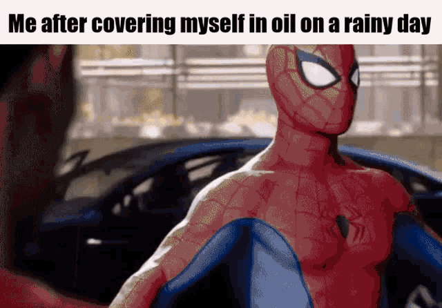 a picture of a spider man with a caption that says me after covering myself in oil on a rainy day