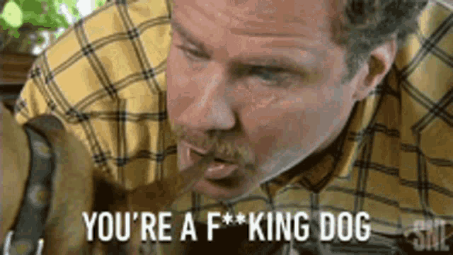 a man with a mustache is holding a dog and saying you 're a f * king dog
