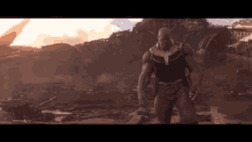 thanos from the movie avengers infinity war stands in a field