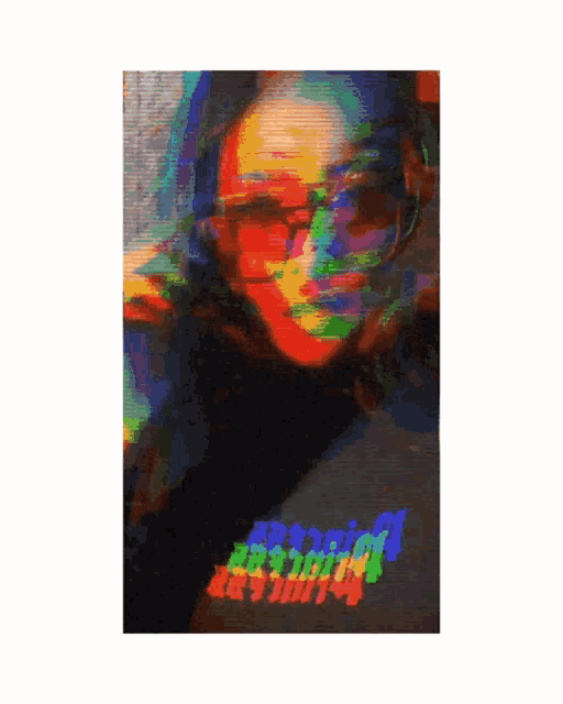 a blurry picture of a woman wearing sunglasses and a black shirt that says " anxiety "