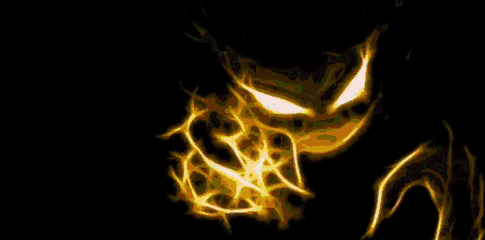 a black background with a yellow glowing object
