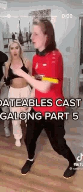 a man and a woman are dancing together in a room .
