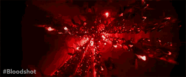 a close up of a person 's eye with #bloodshot written on the bottom