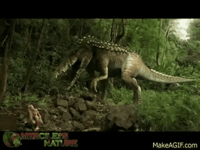 a dinosaur is walking through a lush green forest next to a river .