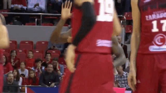 a basketball player with the number 17 on the back of his uniform