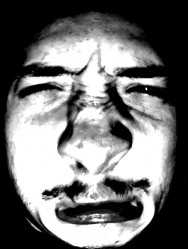 a black and white drawing of a man 's face with a mustache