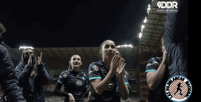 a group of female athletes wearing jerseys that say los rojablancas