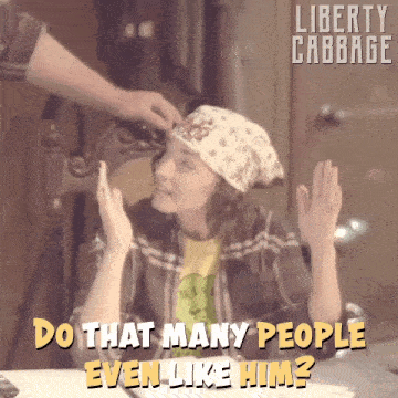 a woman with a bandana on her head says do that many people even like him ?