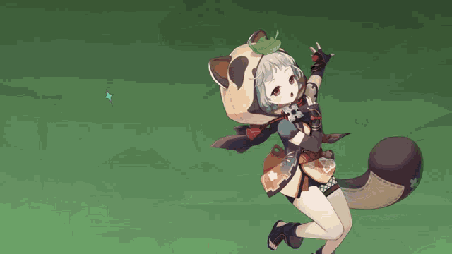 a girl with a raccoon costume is standing in front of a green cross
