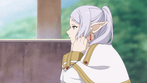 a girl with white hair and elf ears is looking out the window