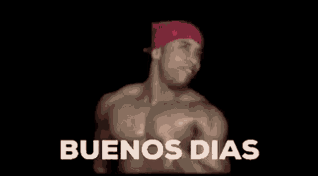 a man in a pink hat says buenos dias on a black background .