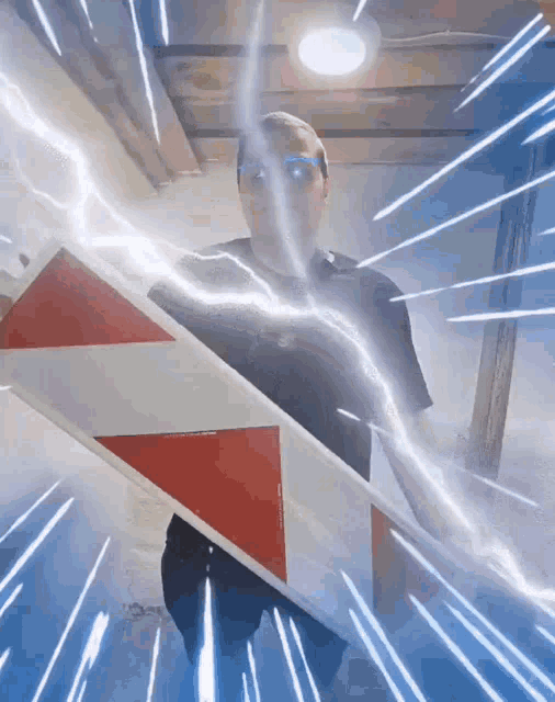 a man holding a red white and blue shield with lightning coming from it