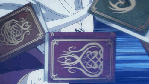 a purple book with a celtic design is surrounded by other books