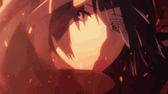 a close up of a person 's face with fire coming out of their eyes
